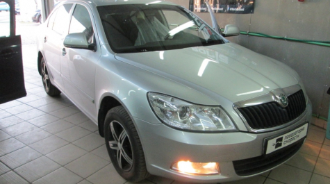 Чип-тюнинг с отключением катализаторов на  Skoda Octavia II 1.6 102hp MT 2011 года выпуска